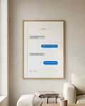 Framed digital art print of a text conversation on a wall in a living room.